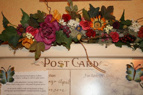 Floral accents adorn the message board in my artist's loft
