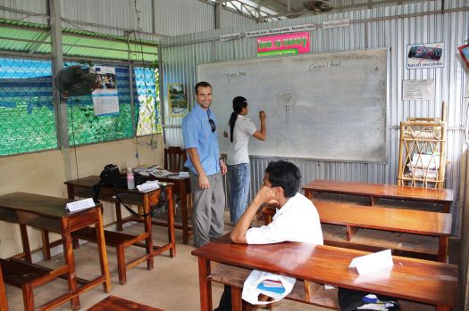 Jesse, Elya's boyfriend,  tutoring at the Cambodian school