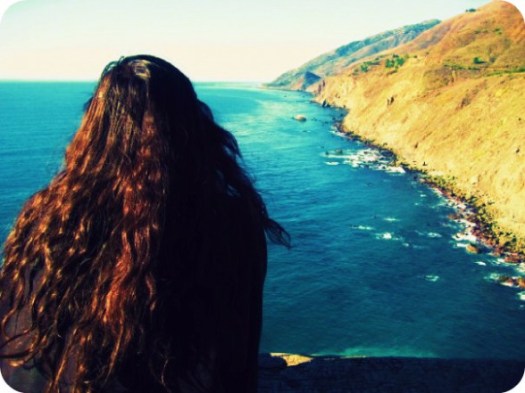 Elya gazing at ocean